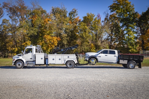 profile of the holmes 600r roatator towing a commercial truck