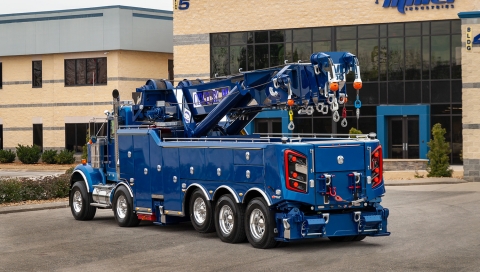 blue century m100 rotator on a kenworth w900 chassis